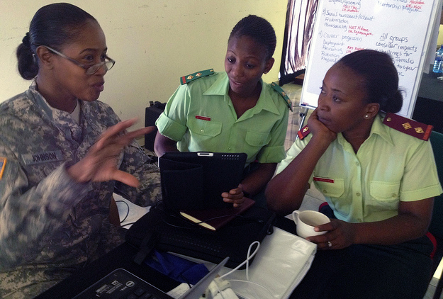 Sgt. Maj. Carolina D. Johnson, U.S. Army Africa equal opportunity sergeant major, discusses Army Regulation governing wear and appearance of Army uniforms and insignia with 1st Lt. Molefhi and 1st Lt. Monare during a Women’s Integration working group in Botswana in April. Currently, the Botswana Defence Force has approximately 100 female officers. They now want to add enlisted females to their ranks. The working groups helped identify some of the challenges they will face while helping to mitigate any issues that may occur. Even though integrating females will be a slow process, Johnson said she was humbled to have an opportunity to be a part of the working groups. (U.S. Army Africa photo)