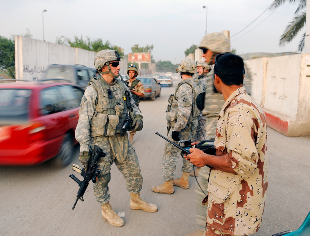 Command Sgt. Maj. Daniel A. Dailey, then the command sergeant major of 3rd Brigade Combat Team, 4th Infantry Division, stops by a checkpoint in Baghdad on Oct. 30, 2008, during his fourth combat deployment. It was announced Nov. 3 that Dailey will become the 15th sergeant major of the Army in January 2015. (Photo courtesy of the U.S. Army)