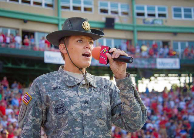 Sgt. Christiana Ball, a drill sergeant at Fort Leonard Wood, Mo., and the 2013 winner of Operation Rising Star, sings “God Bless America” during a Springfield Cardinals game in Springfield, Mo., in June 2014. She will cap off a year of performances with one at the White House on Nov. 6. (Photo by Michael Curtis)