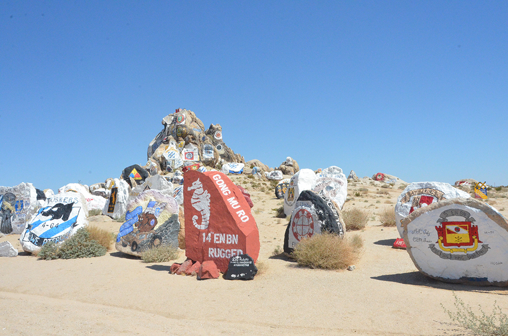 The National Training Center at Fort Irwin, Calif., has a unique painted-rock monument that stands tribute to all the units that have completed a rotation in the 1,200-square-mile installation. For the past 13 years that training has focused on the counterinsurgency threat in Iraq and Afghanistan. Today, training is centered on decisive action, the ability for units to make informed decisions against any threat. (Photo by Pablo Villa)