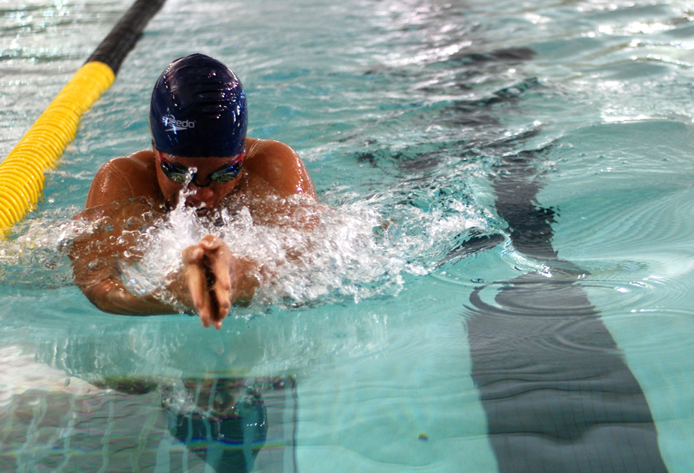 Sgt. Kawaiola Nahale, assigned to the 311th Signal Command, swims the 25-meter breaststroke during the Army Trials on April 2 at Fort Bliss, Texas. (Photo by Meghan Portillo/NCO Journal)