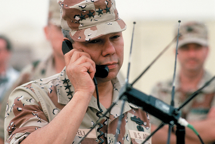 Chief of Staff, Gen. Colin Powell, communicates via satellite with the Pentagon during Operation Desert Shield. (U.S. Army photo by Sgt. Jeff Wright)