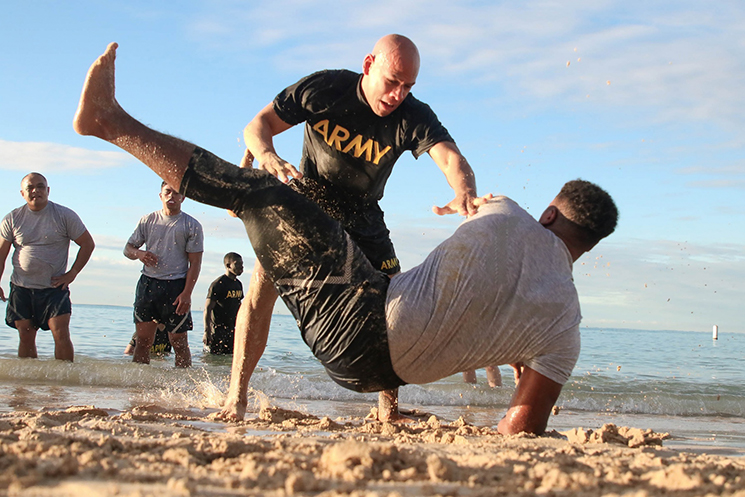 A U.S. Army Soldier takes down a U.S. Air Force Airman.