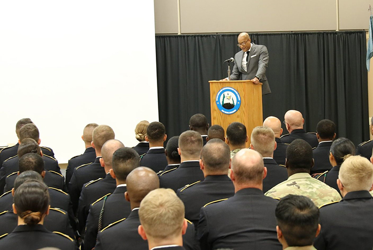John L. Hewitt III gives a speech at a Basic Leaders Course graduation ceremony.