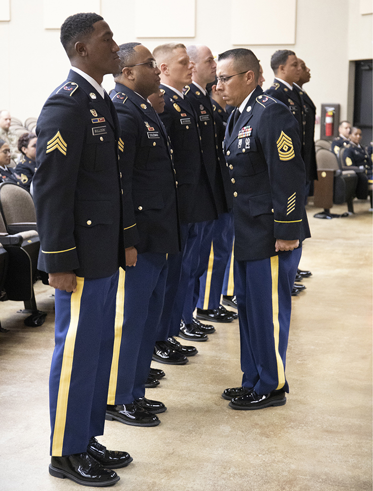 U.S. Army Staff Sgts. conduct an inventory of Army Combat Fitness Test equipment