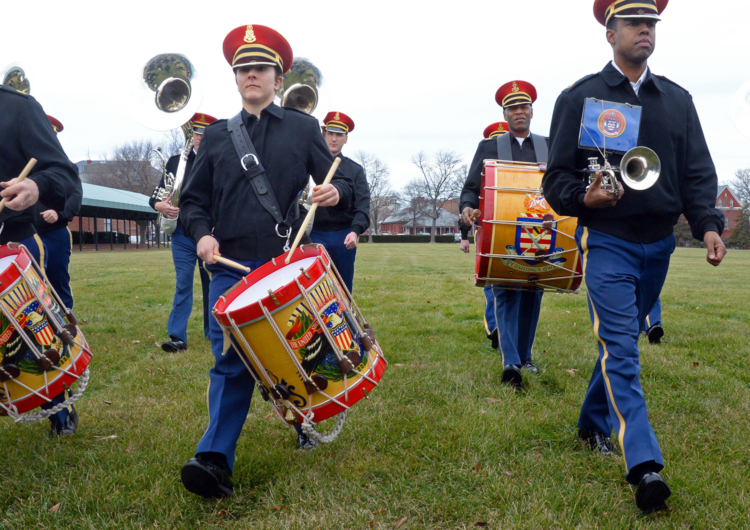 Staff Sgt. Sidonie H. Wade (center), a percussionist for U.S. Army Band “Pershing’s Own,” marches during a rehearsal on Summerall Field at Fort Myer, Virginia. The band was preparing for the inaugural parade. (Photo by Jonathan (Jay) Koester / NCO Journal)