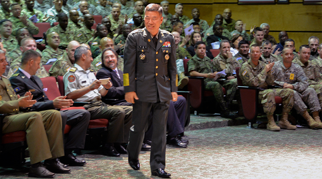 Attendees applaud as Command Sgt. Maj. Lee Gil Ho, command sergeant major of the Combined Forces Command, Republic of Korea and Ground Component Command, is inducted into the International Student Hall of Fame. (Photo by Spc. James Seals / NCO Journal)