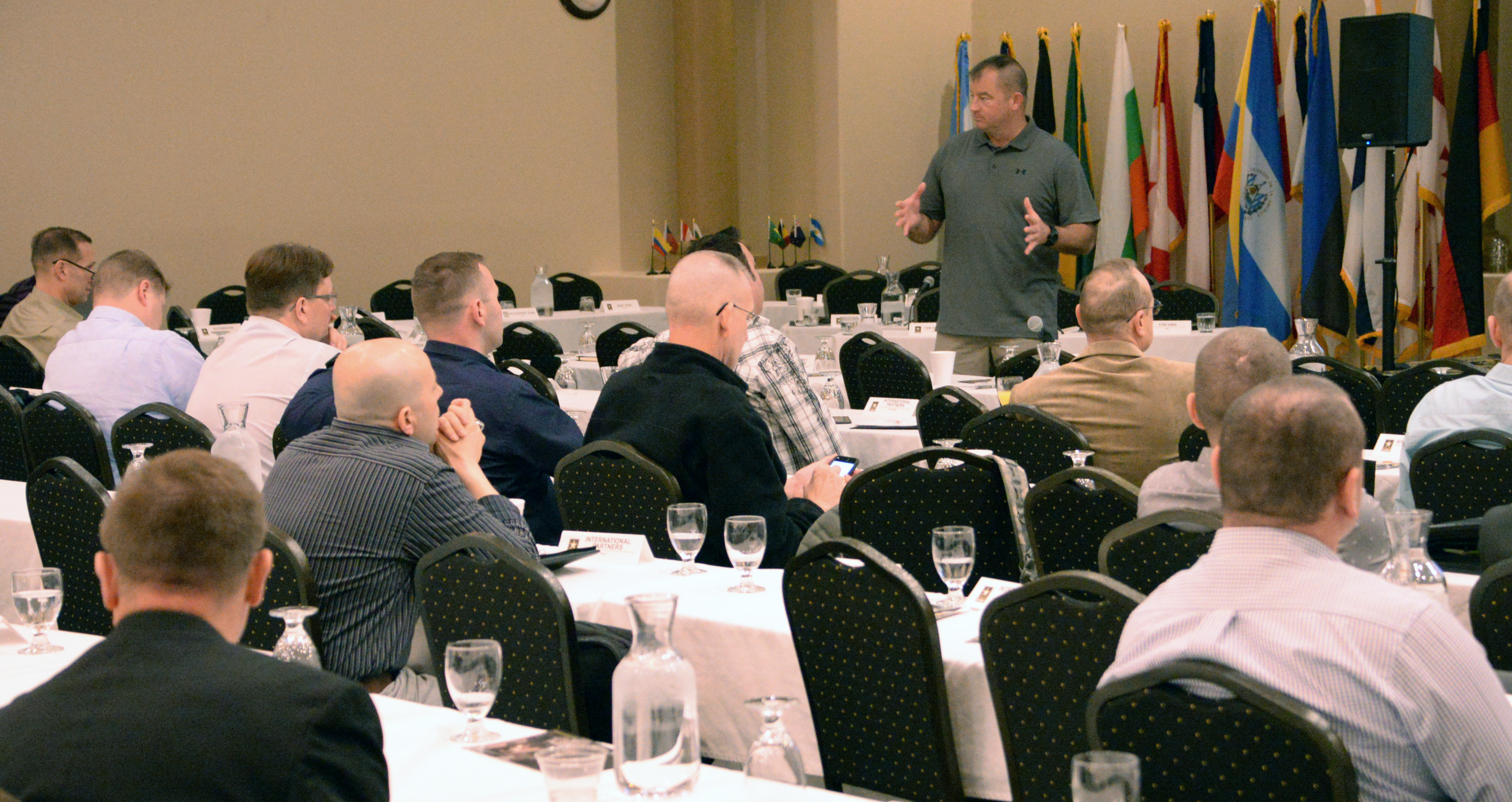 Command Sgt. Maj. Jeffrey Sweezer, command sergeant major of the Joint Multinational Training Command in Grafenwoehr, Germany, gives a brief on the command to a group of senior enlisted leaders from Africa and Europe on April 13 in El Paso, Texas. (Photo by Spc. James Seals)