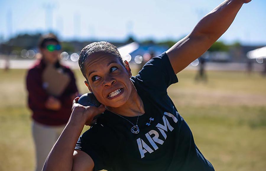 Staff Sgt. Altermese Kendrick leans back to throw