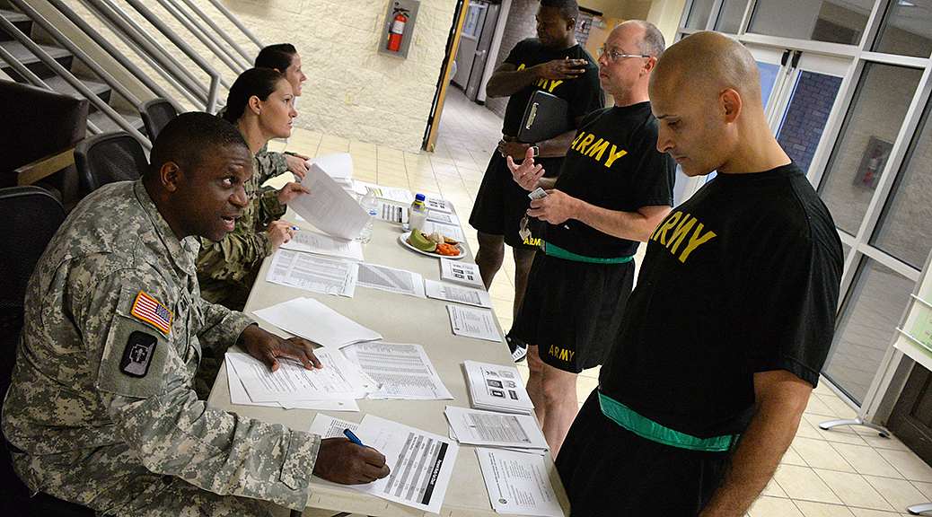 Lt. Col. Devvon Bradley, a licensed clinical social worker, left, speaks with a student in the U.S. Army Sergeants Major Academy’s Class 67 during an assessment for the Executive Wellness Program. (Photo by Clifford Kyle Jones / NCO Journal)