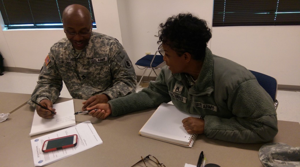 Sgt. 1st Class Alan McCoy, staff administrative assistant with A Company, 94th Combat Support Hospital, and Staff Sgt. Tonya O’Connell, mental health tech with 176th Medical Brigade, practice public affairs skills in Seagoville, Texas. All NCOs will be required to improve their writing skills under TRADOC’s education plans. (Photo by Staff Sgt. Kai L. Jensen)