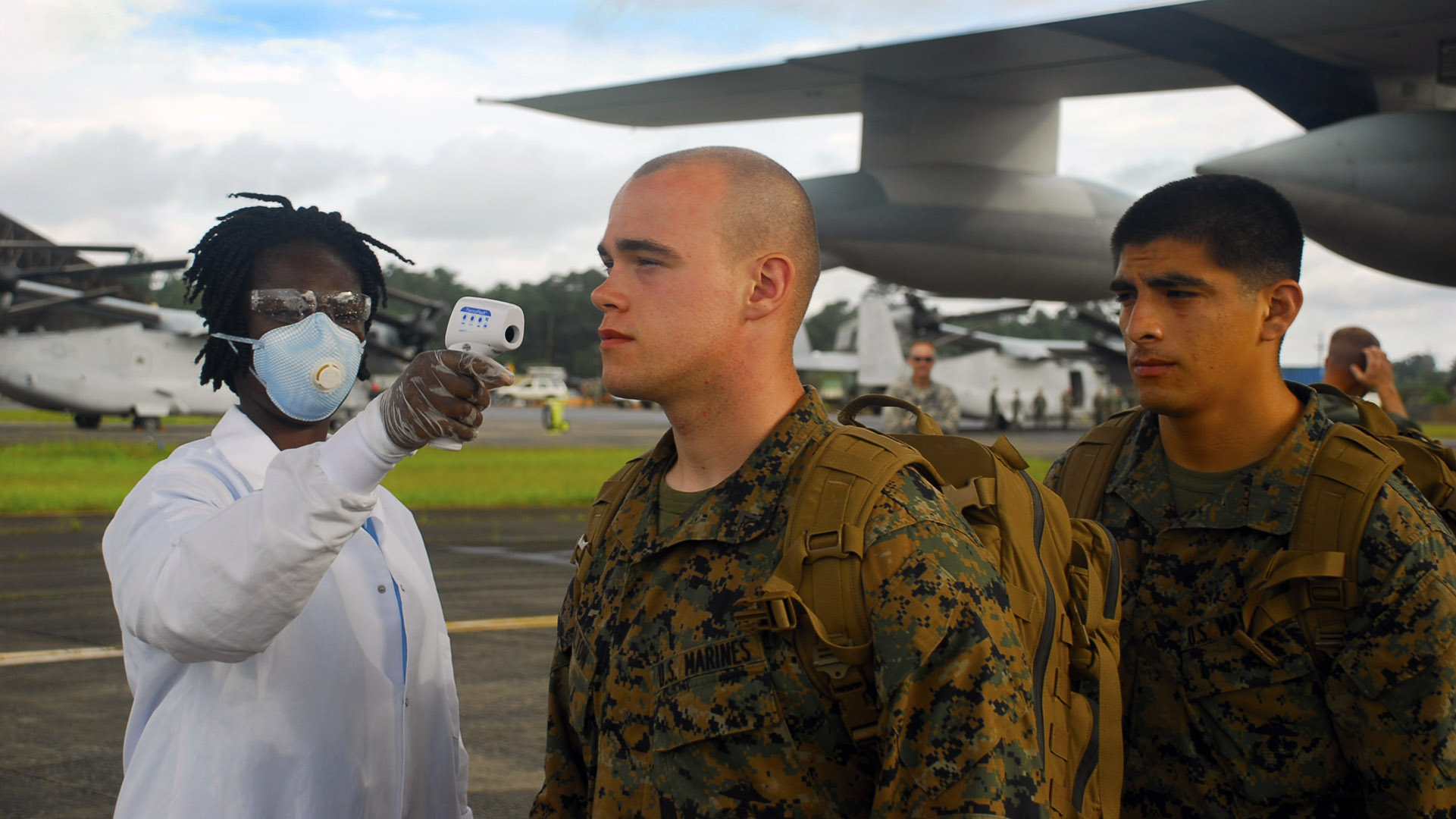 U.S. Marines and Soldiers enter a U.S. Marine Corps MV-22 aircraft after a site survey of a future Ebola Treatment Unit site near Barclayville, Grand Kru, Liberia. The U.S. Agency for International Development is the lead U.S. government organization for Operation United Assistance. The U.S. Army is supporting the effort by providing mission command, logistics, training and engineering support to contain the Ebola virus outbreak. (Photo by Pfc. Craig Philbrick/U.S. Army)