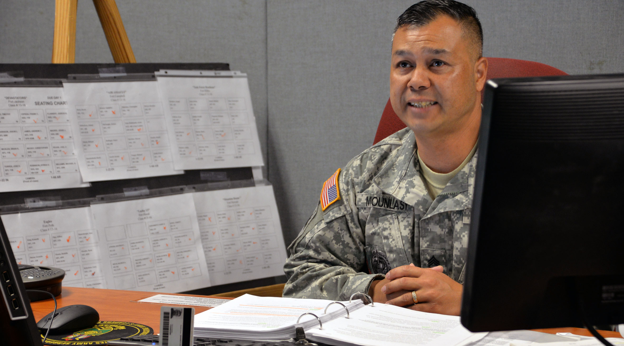 Sgt. 1st Class Khambao Mounlasy, a VTT instructor, says he values sharing his experience with noncommissioned officers out in the field. Mounlasy spoke with students and tries out the functions of the new enhanced equipment. (Photo by Martha C. Koester / NCO Journal)