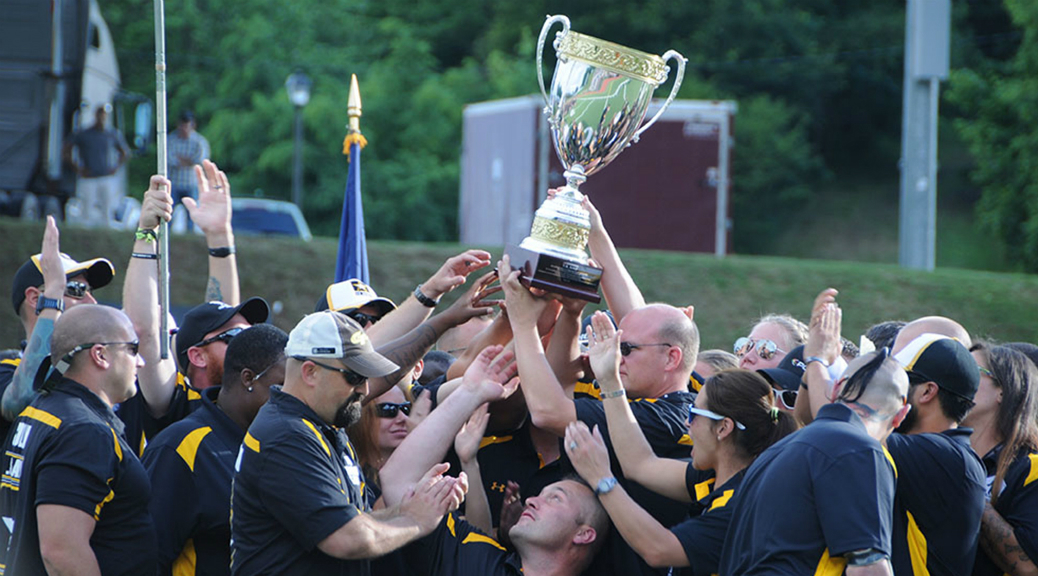 Team Army raises the Chairman’s Cup trophy in celebration at the 2015 Department of Defense Warrior Games, June 28, 2015. The Army won the Chairman’s Cup after earning 162 medals during the games, earning 141 points towards the Chairman’s Cup competition. (Photo by Keith Oliver / U.S. Army)