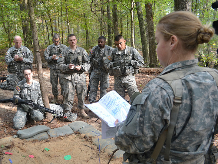 Officer candidate Paulette Prince conducts a mission brief during a field exercise at Officer Candidate School at Fort Benning, Georgia. (U.S. Army photo)