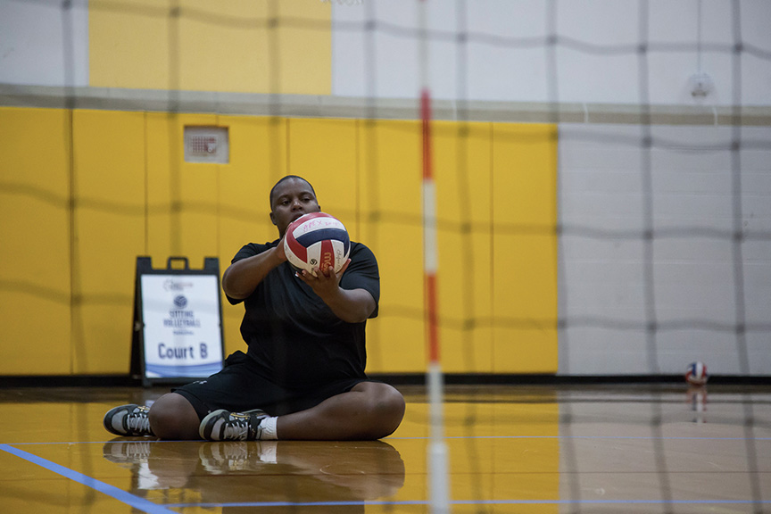 Army Sgt. Monica “Mo” Southall prepares to serve in a sitting volleyball match at the 2016 Defense Department Warrior Games. (DoD photo)