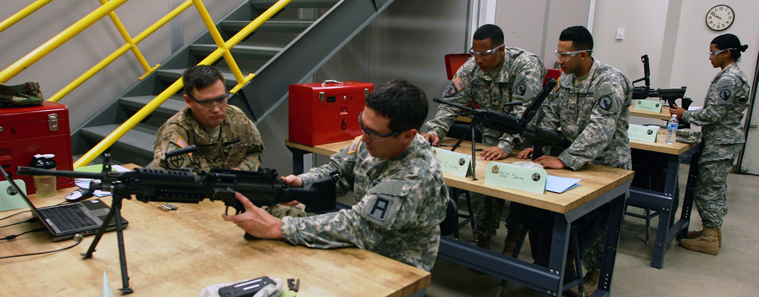 Soldiers attending the Additional Duty Armorer Course at Regional Training Site-Maintenance at Fort McCoy train on maintenance procedures for an M249 machine gun. (Photos by Scott T. Sturkol)