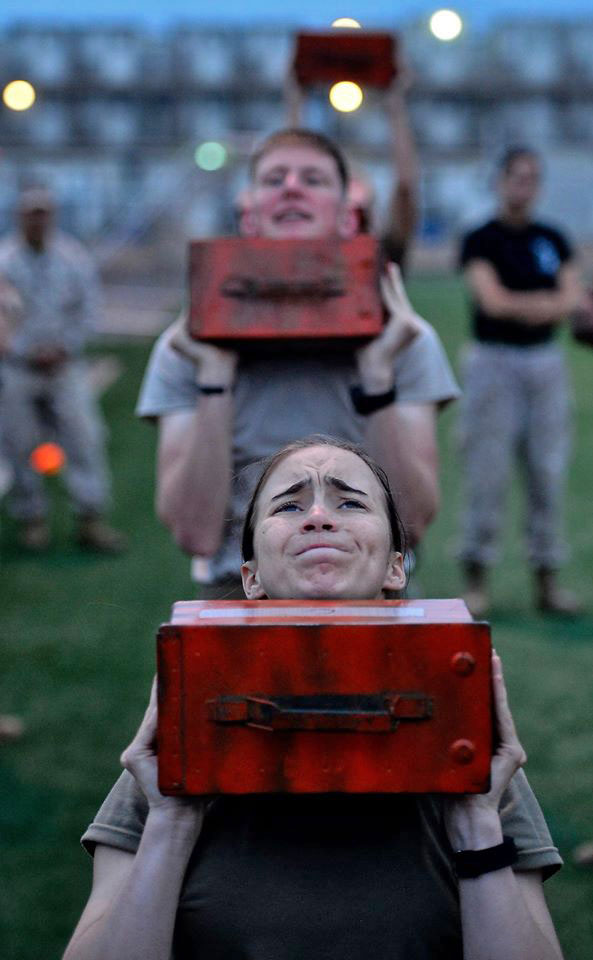 U.S. Army Spc. Jerileigh Bouchard, a student in the Joint Corporals Leadership Development Course, lifts a weighted ammunition can during a combat fitness test in March on Camp Lemonnier, Djibouti. (Photo by Air Force Tech. Sgt. Daniel DeCook)