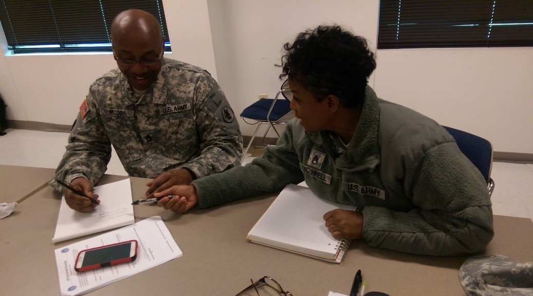 Soldiers talking about writing